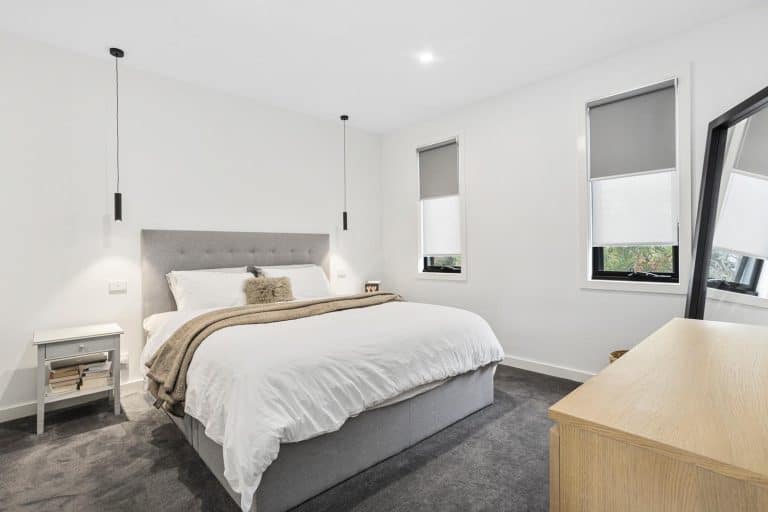 Dual Roller Blinds in a Bedroom