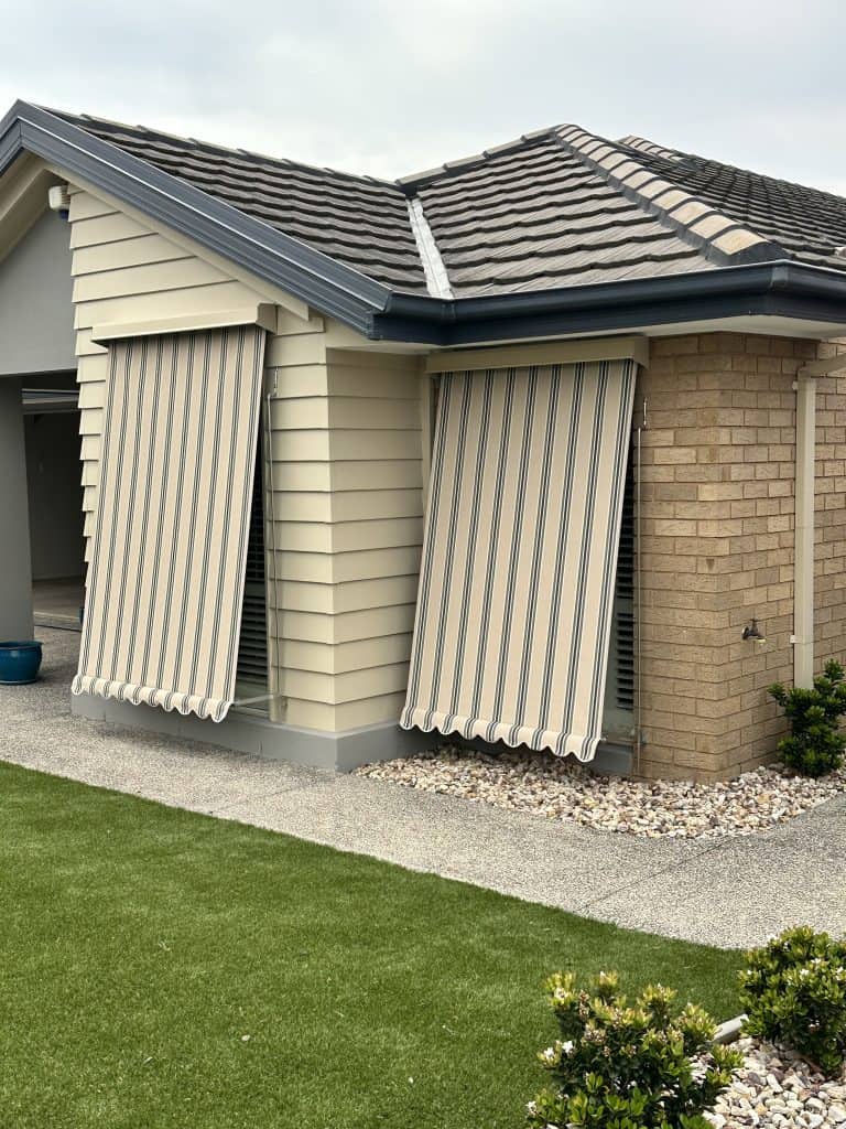 Classic Striped canvas awnings on the front brick house in Hillside Vic