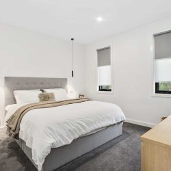 Dual Roller Blinds in a Bedroom
